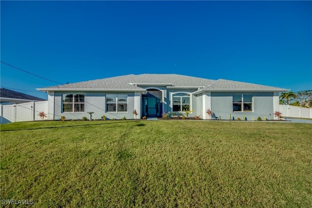 view of front facade featuring a front yard