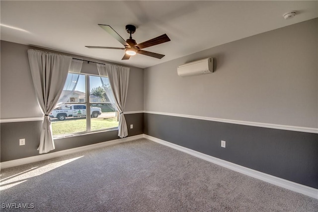 spare room featuring carpet, ceiling fan, and a wall mounted AC