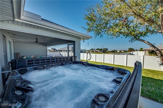 view of patio / terrace with a hot tub