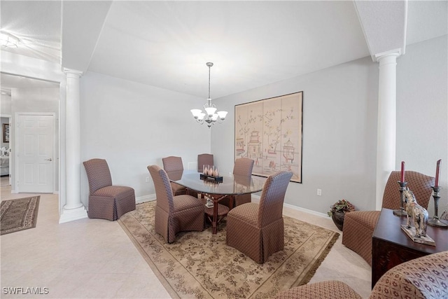 tiled dining space with a notable chandelier