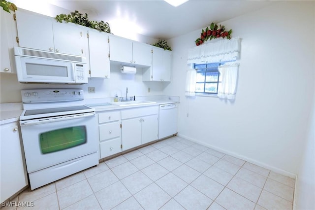 kitchen featuring white cabinets, white appliances, and sink