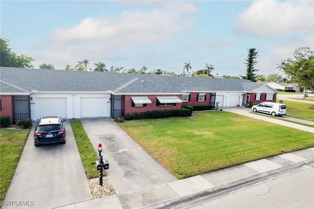 single story home featuring a front yard