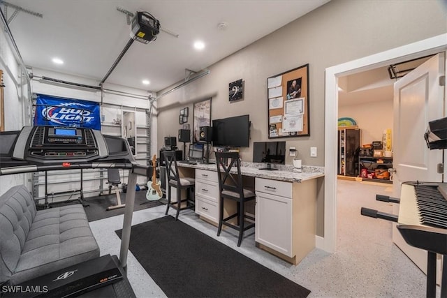 office with light speckled floor and a garage