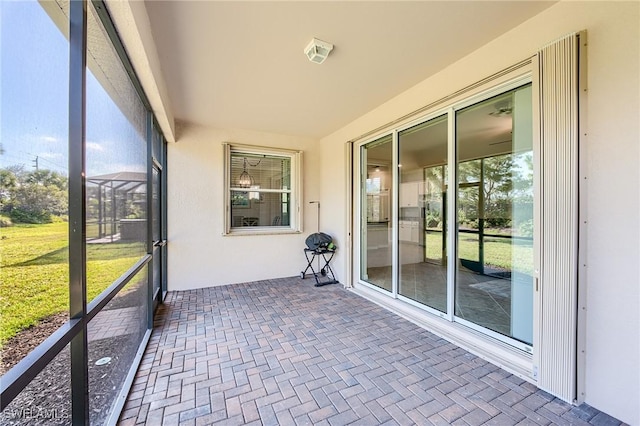 unfurnished sunroom featuring a healthy amount of sunlight