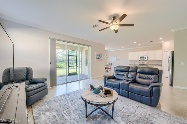 tiled living room featuring ceiling fan and crown molding