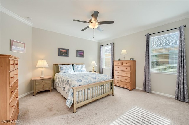 bedroom with light colored carpet, ceiling fan, and ornamental molding