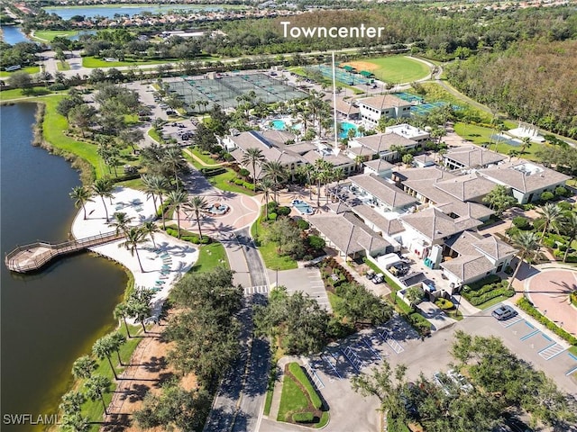 birds eye view of property with a water view