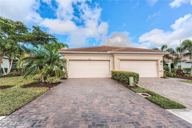 view of front of property featuring a garage