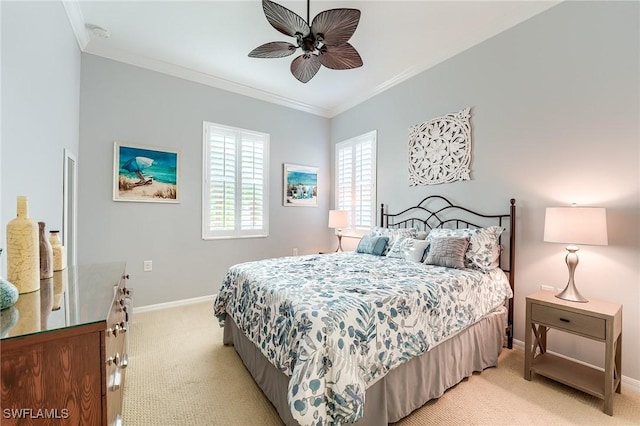 bedroom with ceiling fan, ornamental molding, and light carpet