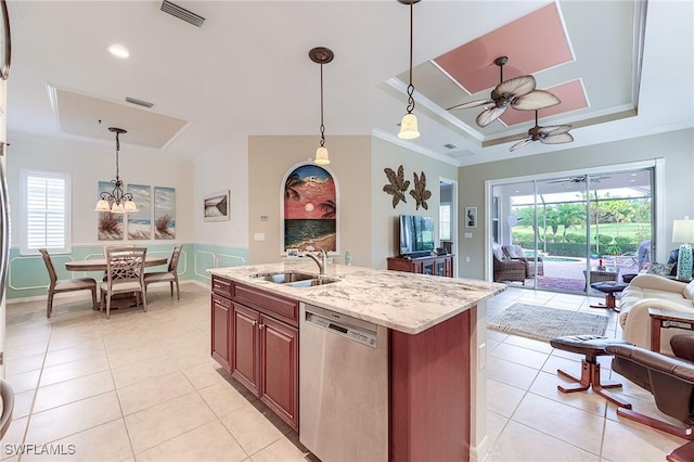 kitchen with decorative light fixtures, a tray ceiling, sink, ceiling fan, and stainless steel dishwasher