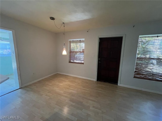 empty room with light wood-type flooring