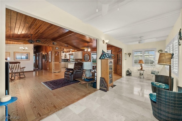 workout room with lofted ceiling, wooden ceiling, and a chandelier