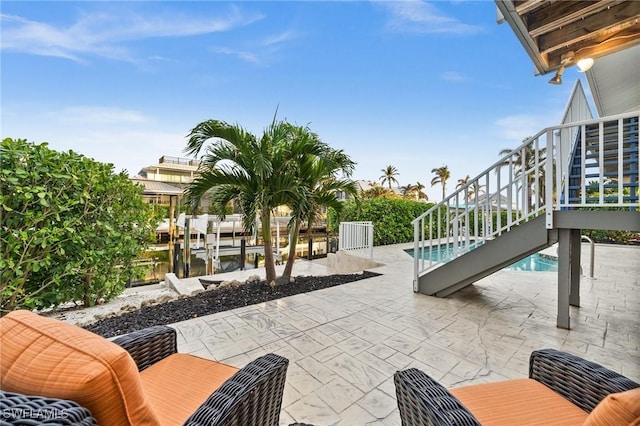 view of patio / terrace with a water view