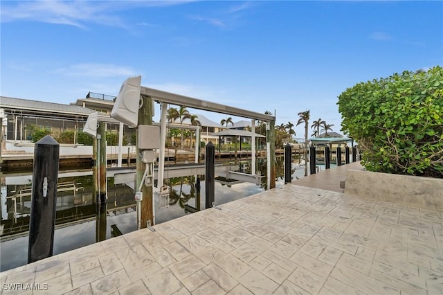 dock area with a water view