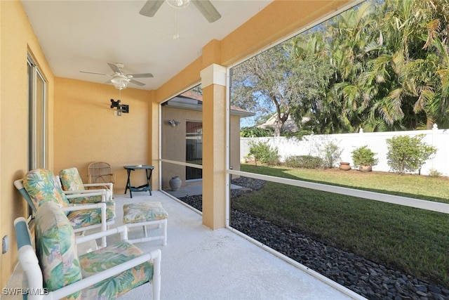 view of patio with ceiling fan