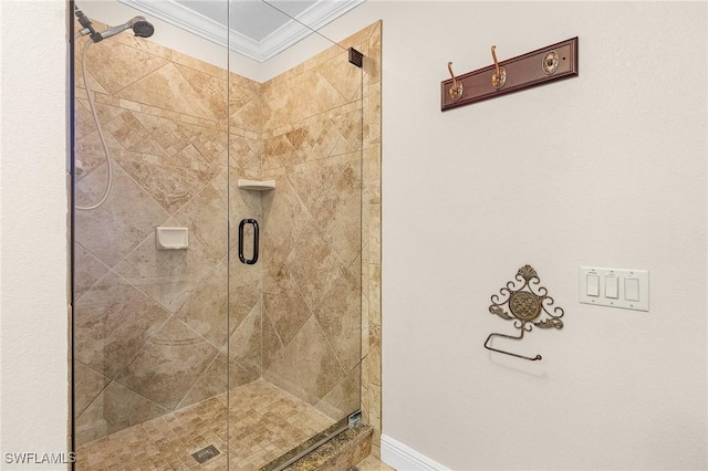 bathroom featuring an enclosed shower and ornamental molding