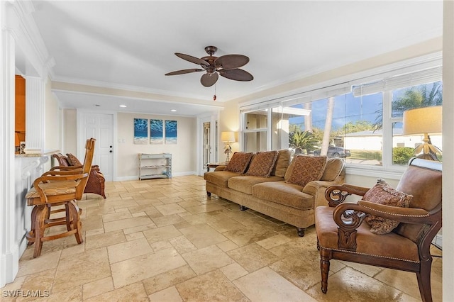 living room featuring crown molding and ceiling fan