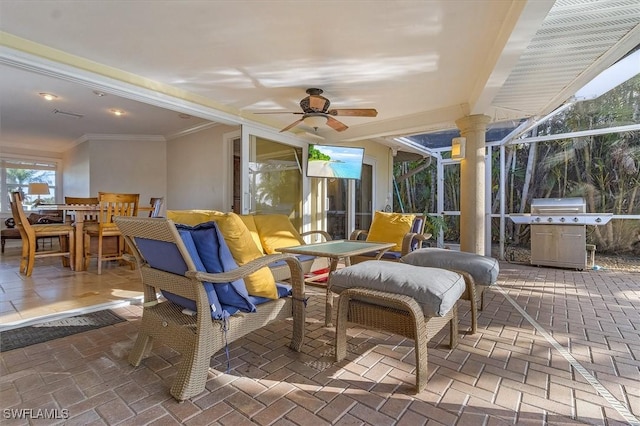 view of patio / terrace featuring ceiling fan, a lanai, and a grill