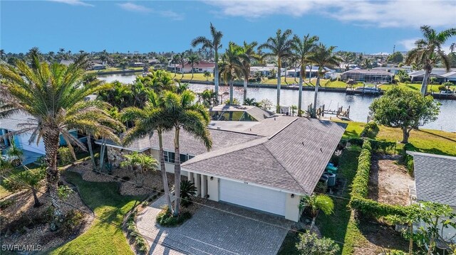 bird's eye view with a water view