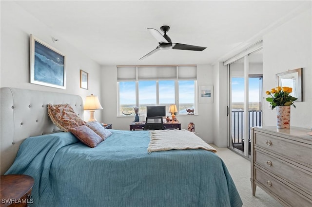 bedroom with light carpet, access to outside, and ceiling fan