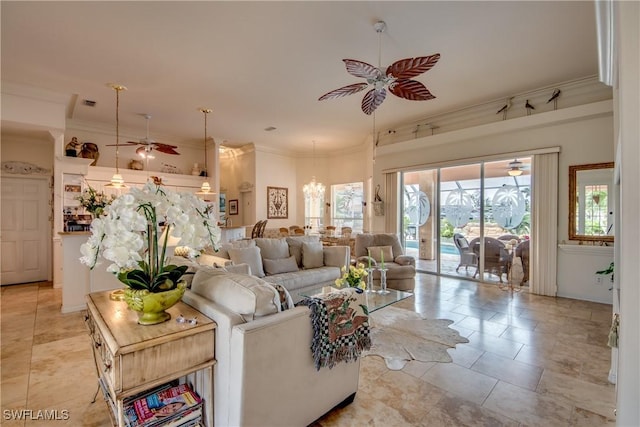 living room with ceiling fan and crown molding