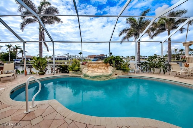 view of pool featuring a lanai and a patio area