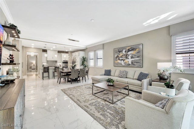 living room featuring ornamental molding