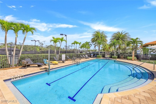 view of swimming pool featuring a patio