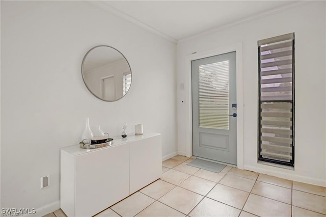 doorway to outside with crown molding and light tile patterned floors