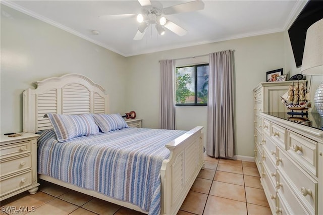 bedroom featuring ceiling fan, light tile patterned floors, and crown molding