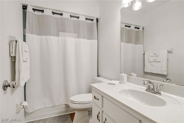 full bathroom featuring vanity, toilet, and shower / bath combo with shower curtain