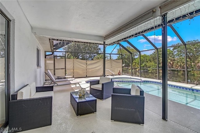 exterior space with a lanai, an outdoor living space, and a pool with hot tub