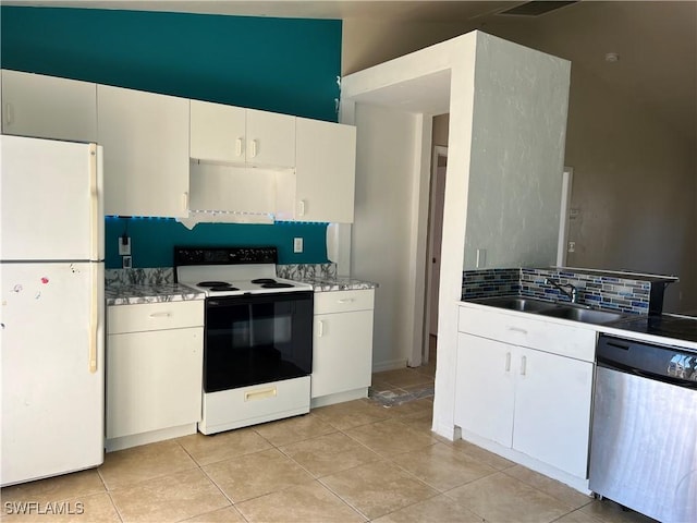 kitchen featuring sink, light tile patterned floors, tasteful backsplash, white appliances, and white cabinets