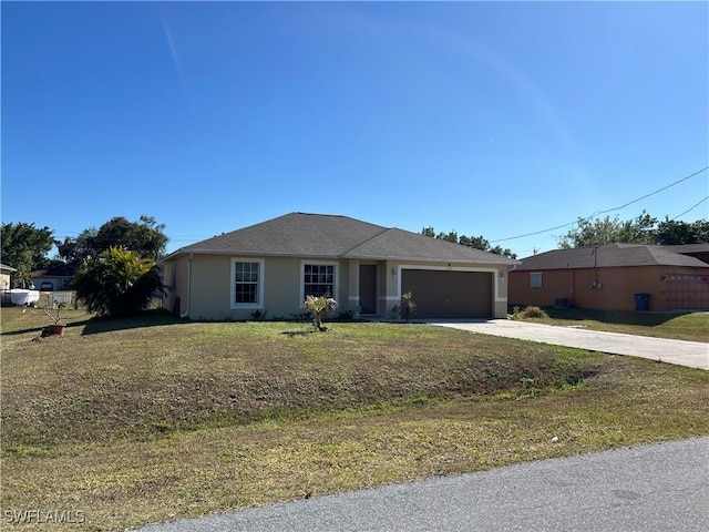 ranch-style house with a garage and a front lawn