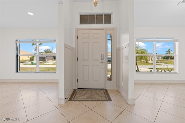 entrance foyer with light tile patterned floors