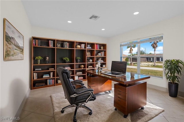 home office featuring light tile patterned floors