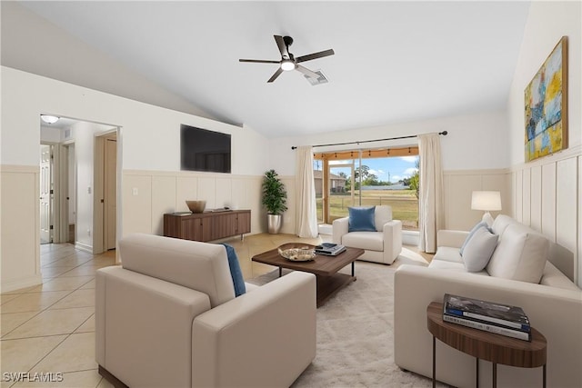 tiled living room with vaulted ceiling and ceiling fan