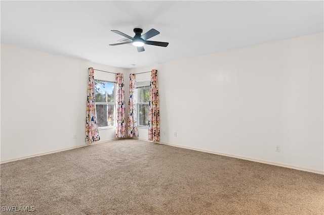 carpeted empty room with ceiling fan