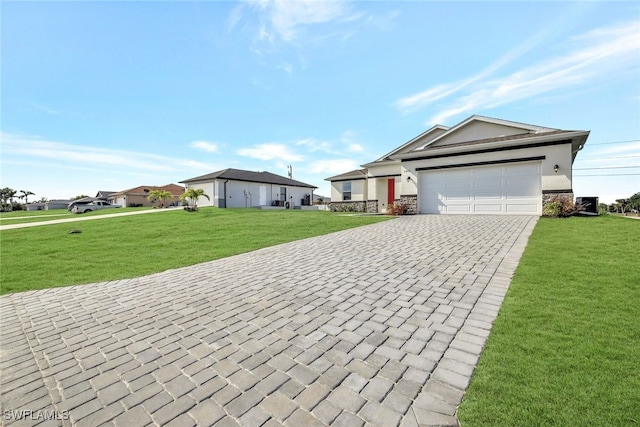 ranch-style home featuring a garage and a front yard