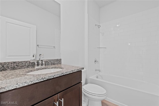 full bathroom featuring vanity, toilet, and shower / washtub combination