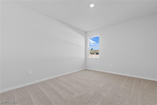 empty room featuring carpet flooring