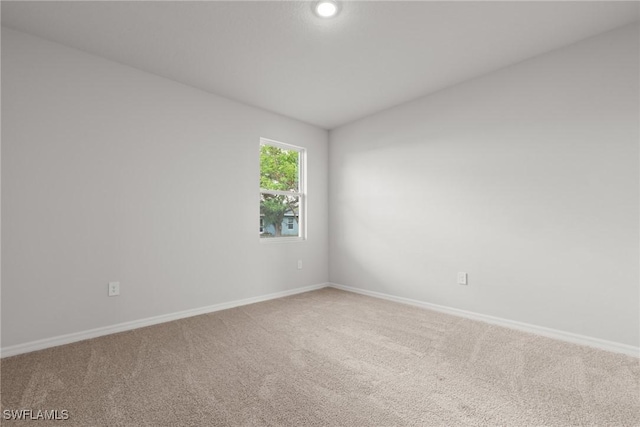 unfurnished room featuring carpet floors