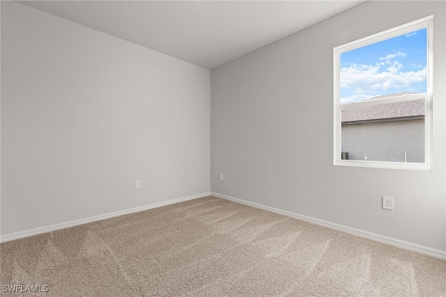 unfurnished room with carpet floors