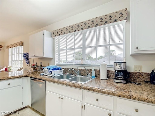 7397 Grande Pine Rd, Bokeelia, FL 33922 - kitchen featuring white cabinets, dishwasher, sink, and a wealth of natural light