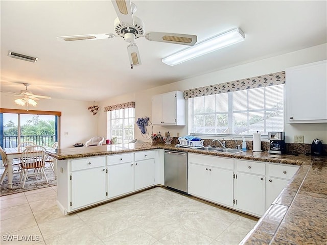 7397 Grande Pine Rd, Bokeelia, FL 33922 - kitchen featuring kitchen peninsula, white cabinets, ceiling fan, sink, and dishwasher