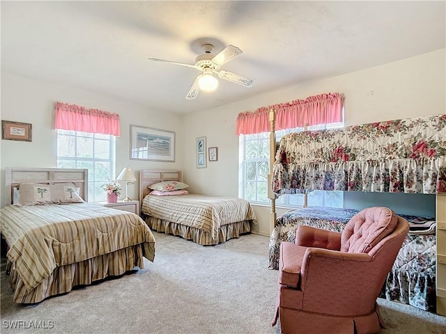 7397 Grande Pine Rd, Bokeelia, FL 33922 - bedroom with ceiling fan and carpet floors