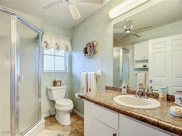 7397 Grande Pine Rd, Bokeelia, FL 33922 - bathroom featuring vanity, a shower with door, tile patterned floors, ceiling fan, and toilet