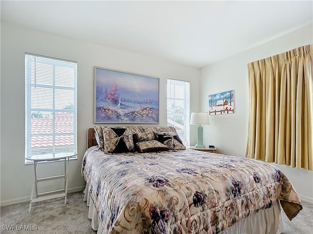7397 Grande Pine Rd, Bokeelia, FL 33922 - bedroom featuring light carpet