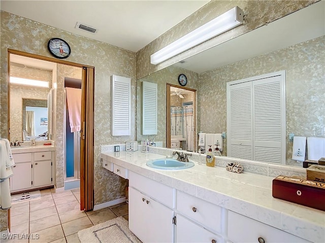 7397 Grande Pine Rd, Bokeelia, FL 33922 - bathroom featuring tile patterned flooring and vanity