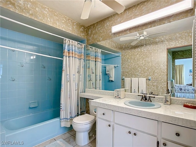 7397 Grande Pine Rd, Bokeelia, FL 33922 - full bathroom with tile patterned floors, vanity, ceiling fan, shower / bathtub combination with curtain, and toilet